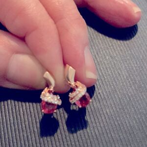 Pretty pink earrings and gold tone latch hook